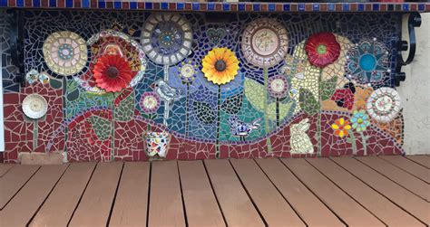 is mural mosaic legit What role does color play in the perception of murals and mosaic artworks?